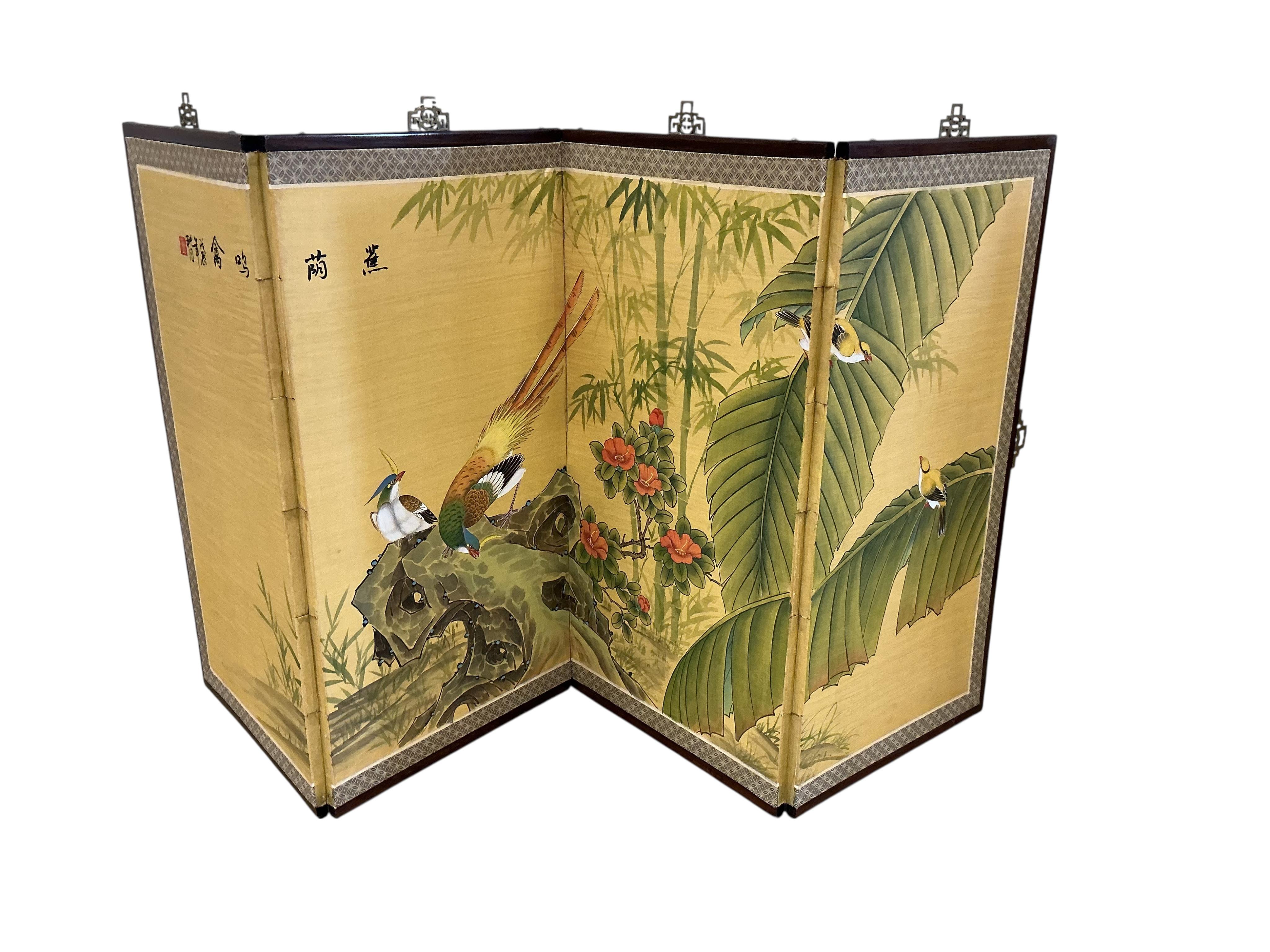 A modern Japanese gold ground four fold screen and a modern Japanese four panelled screen, larger height 92cm